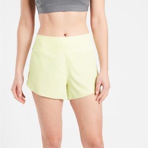 Athleta Tequila Green Run With It 3.5 inch shorts.